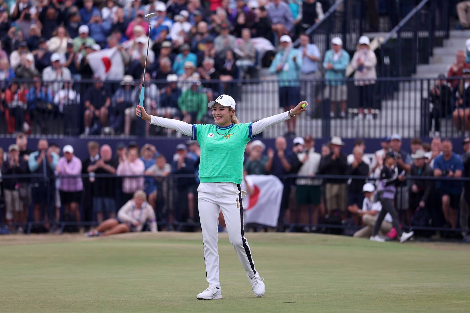 Shiho Kuwaki of Japan celebrates victory on the 18th green during a second playoff round during the final round of the AIG Women's Open 2026 at Royal Lytham & St. Annes.